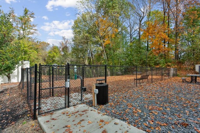 view of gate featuring central AC