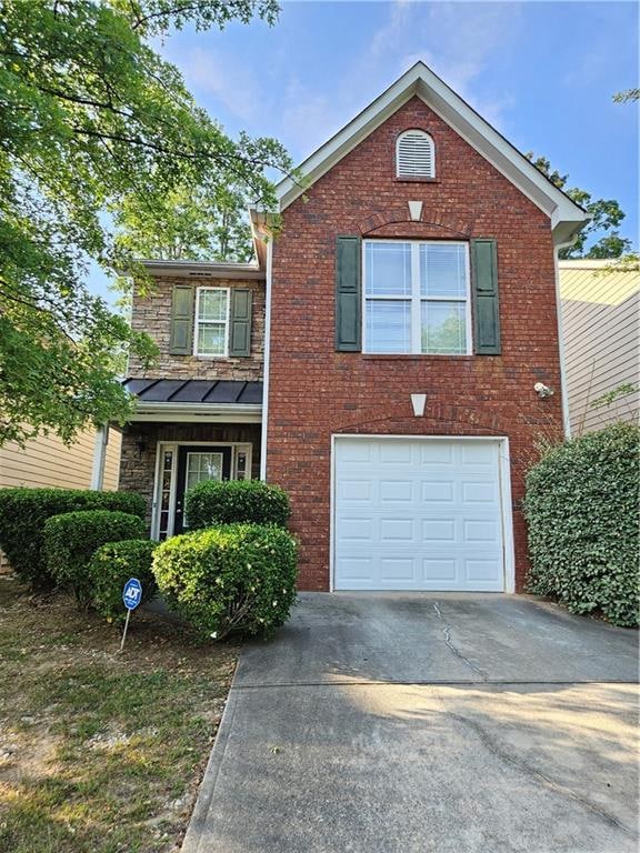 view of front of home with a garage