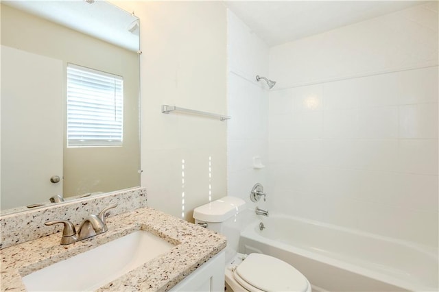 full bath with toilet, bathtub / shower combination, and vanity