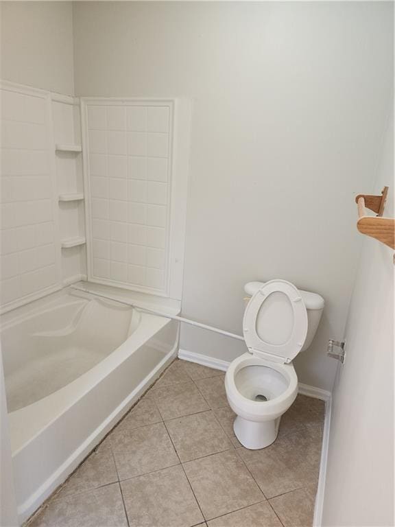 full bathroom featuring a bath, baseboards, toilet, a shower, and tile patterned floors