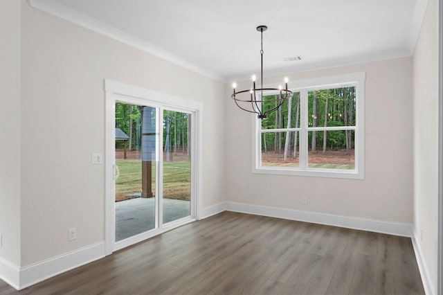 150 Doris Path, Dallas, GA 30157 - unfurnished dining area with a chandelier, wood finished floors, baseboards, and ornamental molding
