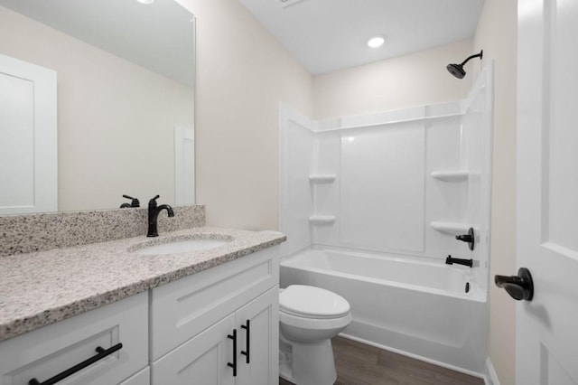 150 Doris Path, Dallas, GA 30157 - bathroom featuring wood finished floors, vanity, shower / tub combination, and toilet