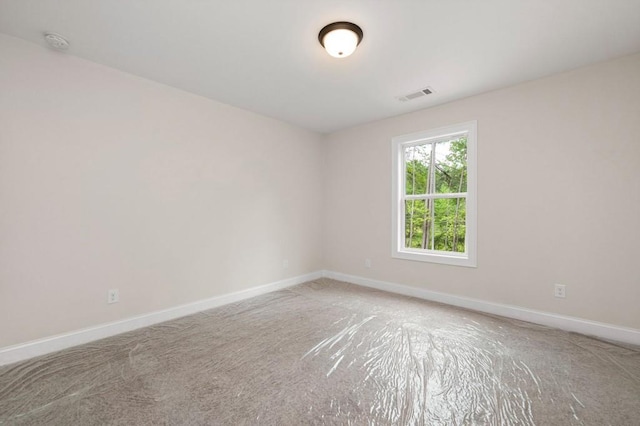 150 Doris Path, Dallas, GA 30157 - spare room with a smoke detector, baseboards, and light colored carpet