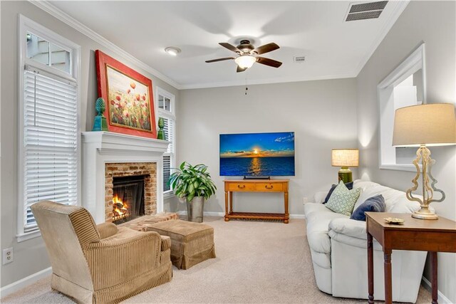 living area with light carpet, a fireplace, visible vents, and crown molding