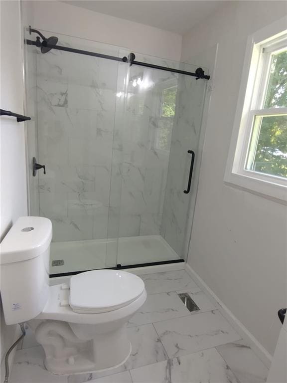 747 Bowman St, Macon, GA 31217 - full bath with a marble finish shower and marble look tile flooring