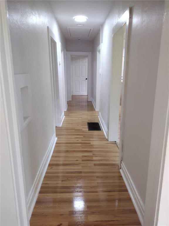 747 Bowman St, Macon, GA 31217 - corridor with attic access and light wood finished floors