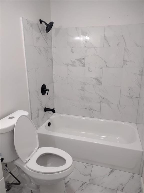 747 Bowman St, Macon, GA 31217 - full bathroom featuring marble look tiles and tub / shower combination