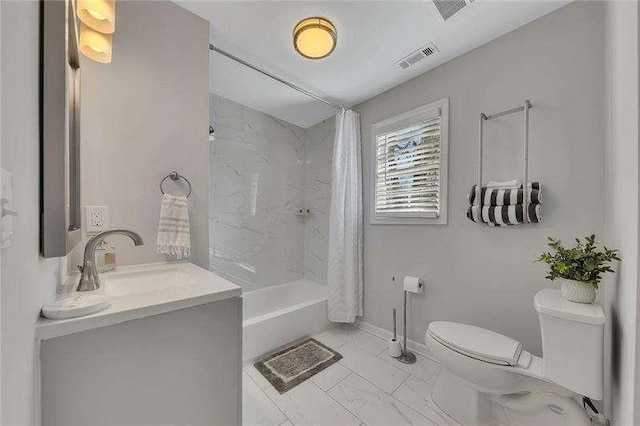 full bathroom featuring vanity, toilet, and shower / bath combo with shower curtain