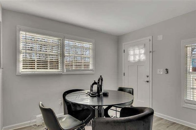 dining space featuring light hardwood / wood-style flooring