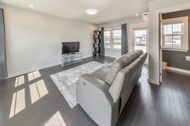 living room featuring dark wood-type flooring