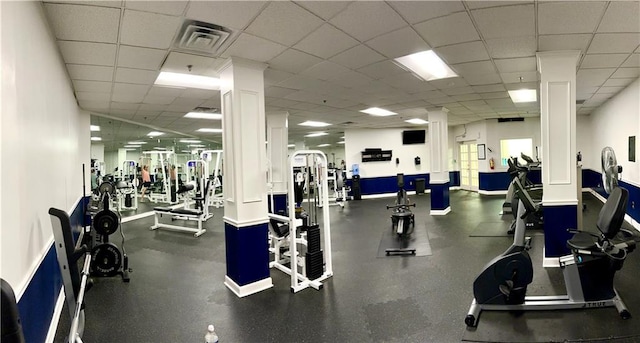 workout area with ornate columns