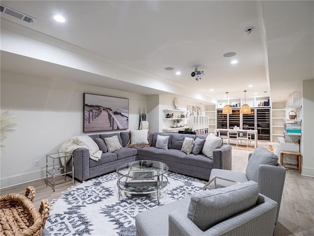 living room with light hardwood / wood-style floors