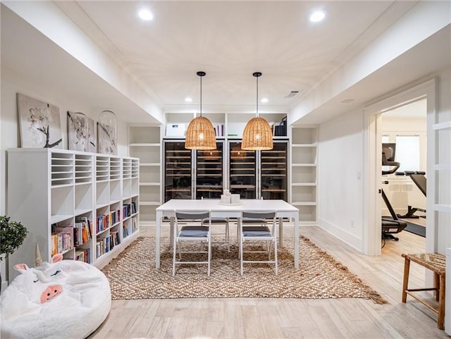 dining area with light hardwood / wood-style floors