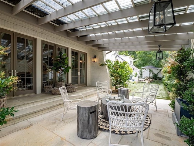 view of patio / terrace featuring a pergola