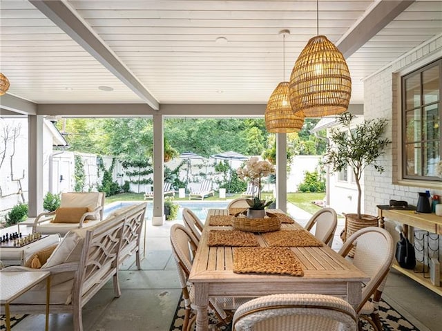 sunroom / solarium with beam ceiling