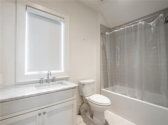 full bathroom featuring toilet, shower / tub combo with curtain, vanity, and tile patterned floors