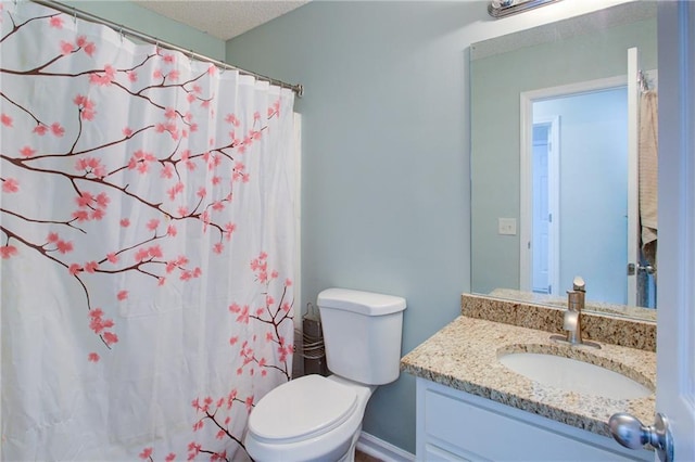 full bathroom with toilet, curtained shower, and vanity