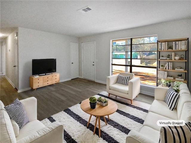 living room featuring dark hardwood / wood-style floors