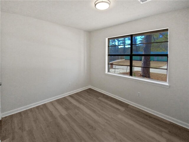 unfurnished dining area featuring light tile patterned flooring and a chandelier