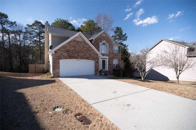 front of property with a garage