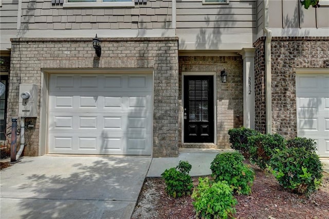 property entrance featuring a garage