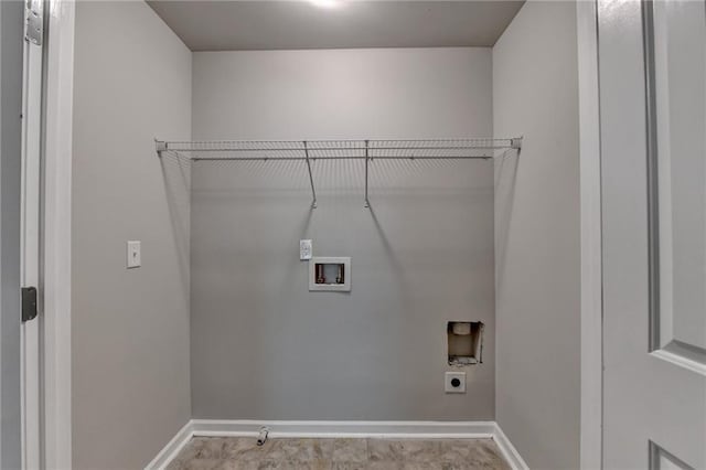 washroom with hookup for an electric dryer and washer hookup