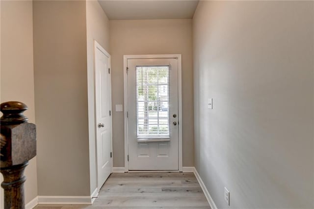 doorway to outside featuring light hardwood / wood-style floors