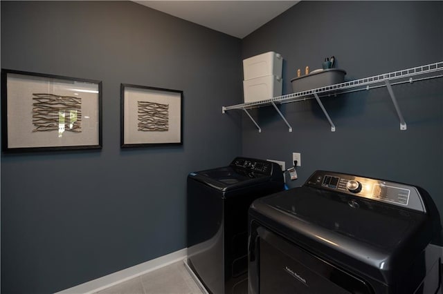 371 Grant Cir Unit 1812, Atlanta, GA 30315 - washroom featuring separate washer and dryer and tile patterned flooring