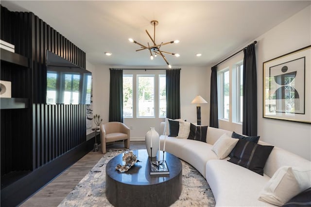 371 Grant Cir Unit 1812, Atlanta, GA 30315 - living room featuring wood finished floors, healthy amount of natural light, recessed lighting, and a chandelier