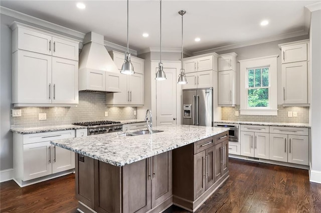 kitchen featuring dark hardwood / wood-style flooring, backsplash, crown molding, and appliances with stainless steel finishes