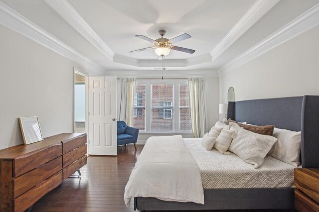346 Ardmore Ct, Atlanta, GA 30309 - bedroom featuring dark wood finished floors, ornamental molding, ceiling fan, and a raised ceiling