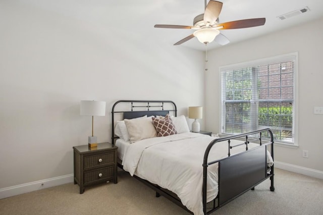346 Ardmore Ct, Atlanta, GA 30309 - bedroom featuring baseboards, visible vents, light colored carpet, and ceiling fan