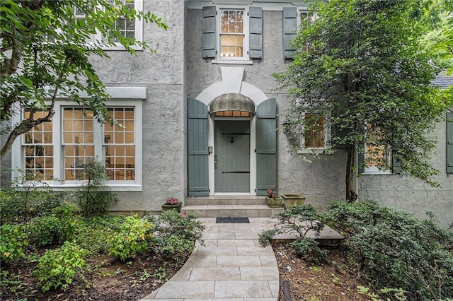 80 Stratford Pl NE, Atlanta, GA 30342 - doorway to property featuring stucco siding
