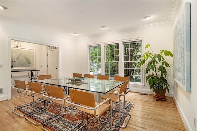 80 Stratford Pl NE, Atlanta, GA 30342 - dining room featuring light wood-style floors and crown molding