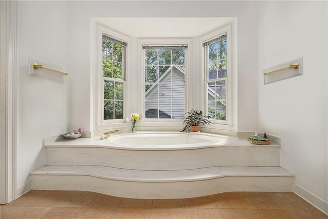 80 Stratford Pl NE, Atlanta, GA 30342 - full bathroom featuring a garden tub and tile patterned floors