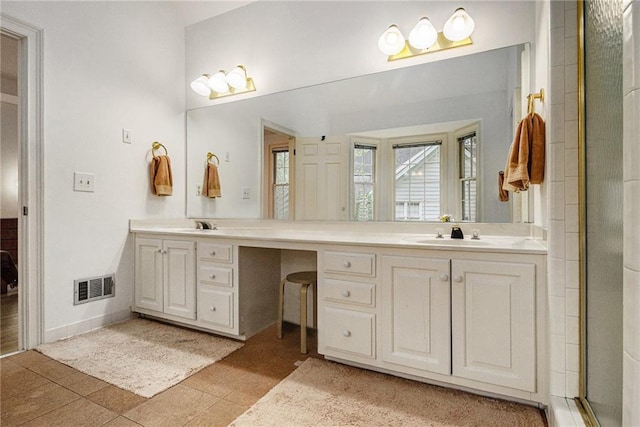80 Stratford Pl NE, Atlanta, GA 30342 - full bathroom featuring double vanity and tile patterned floors