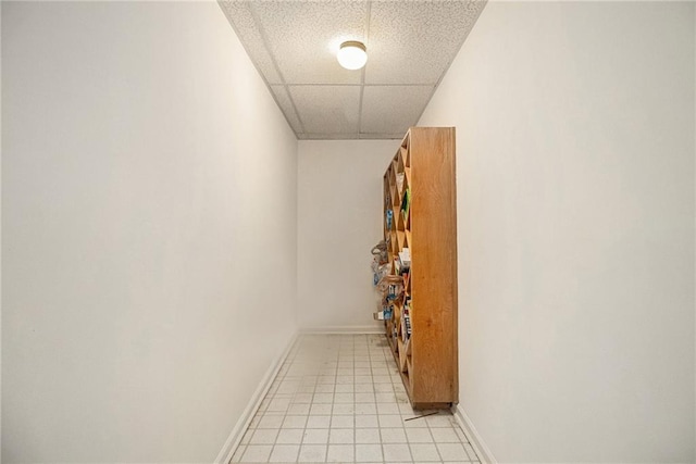 80 Stratford Pl NE, Atlanta, GA 30342 - hall with a drop ceiling and light tile patterned floors
