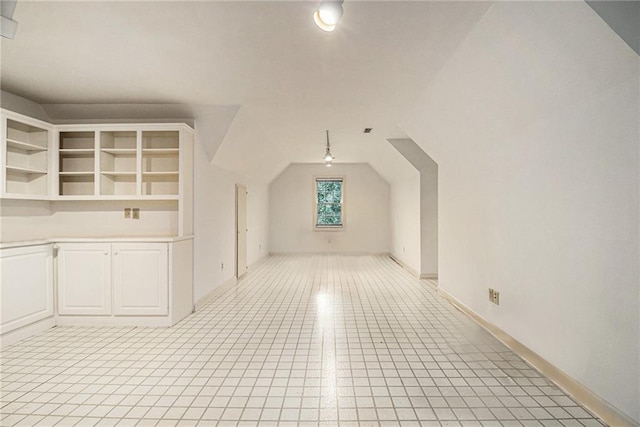 80 Stratford Pl NE, Atlanta, GA 30342 - additional living space featuring lofted ceiling and light tile patterned floors