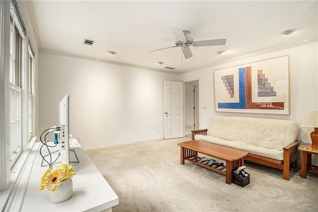 80 Stratford Pl NE, Atlanta, GA 30342 - carpeted living room featuring ornamental molding and a ceiling fan