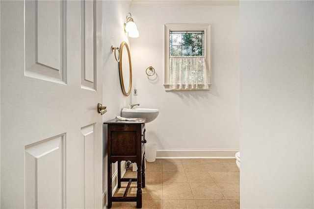 80 Stratford Pl NE, Atlanta, GA 30342 - bathroom featuring vanity, tile patterned floors, and ornamental molding