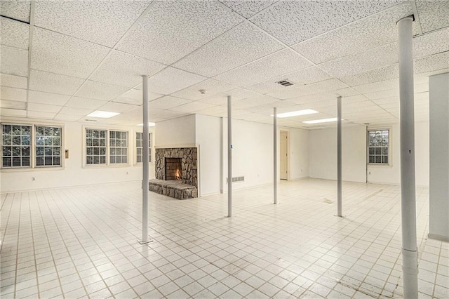 80 Stratford Pl NE, Atlanta, GA 30342 - basement with a fireplace and a paneled ceiling