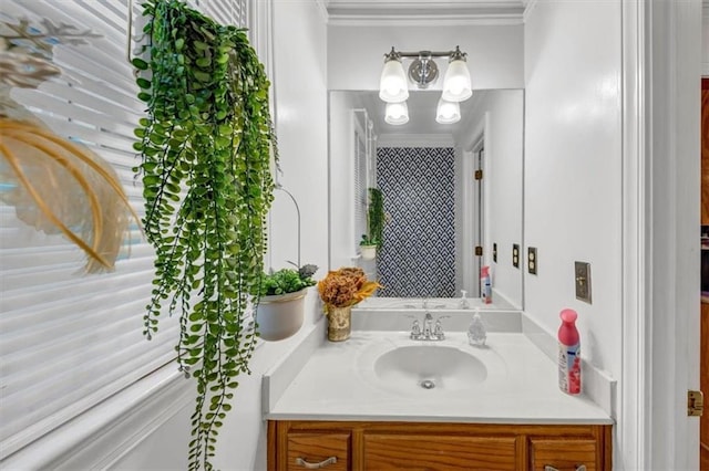 4817 Overland Dr, Powder Springs, GA 30127 - bathroom with vanity, a chandelier, and crown molding