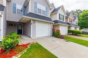 6726 Gallant Ct SE Unit 30, Mableton, GA 30126 - view of front of house with a garage and driveway
