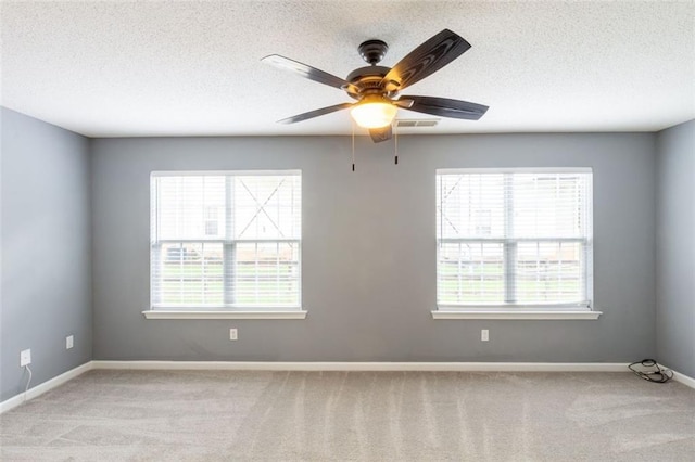 6726 Gallant Ct SE Unit 30, Mableton, GA 30126 - spare room with carpet, a textured ceiling, and ceiling fan