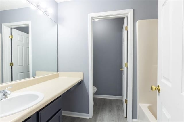6726 Gallant Ct SE Unit 30, Mableton, GA 30126 - full bath featuring vanity, wood finished floors, and shower / bath combination