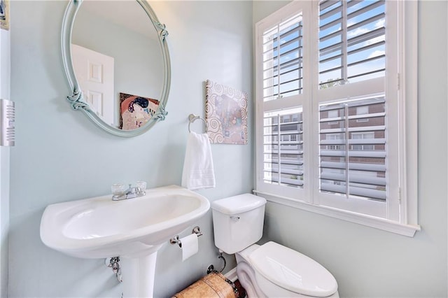 half bathroom with toilet