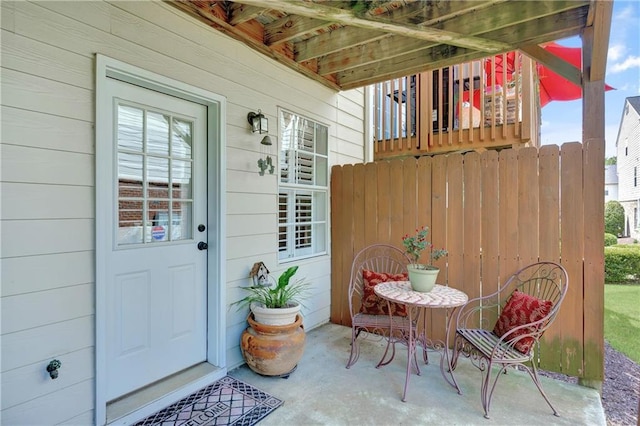property entrance with a patio area