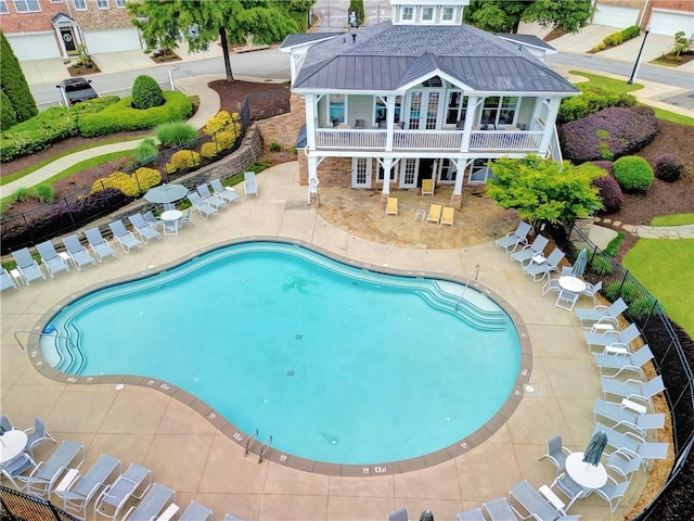 pool featuring a patio