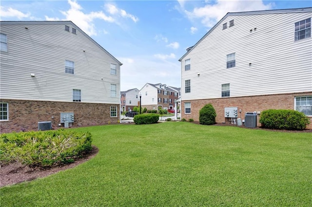 view of yard featuring central AC unit