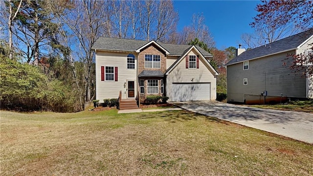 view of front of house with concrete driveway, an attached garage, and a front yard